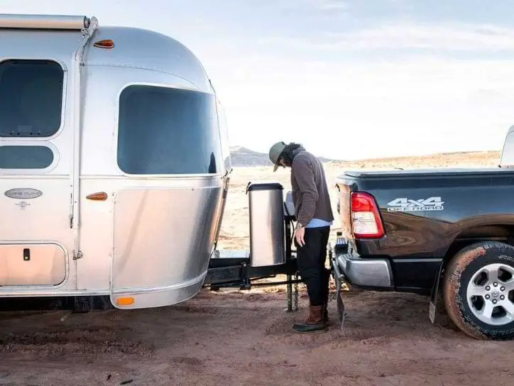Man checking before towing an RV